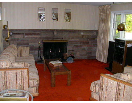 46 Hawthorne Road Ashland, MA 01721 - Photo 2 of 8 a room with furniture and a fireplace