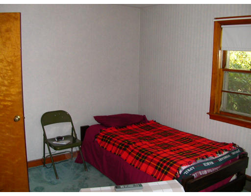 46 Hawthorne Road Ashland, MA 01721 - Photo 7 of 8 a bedroom with a bed and a window
