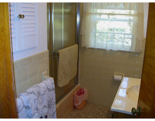 46 Hawthorne Road Ashland, MA 01721 - Photo 8 of 8 a bathroom with a sink and a mirror