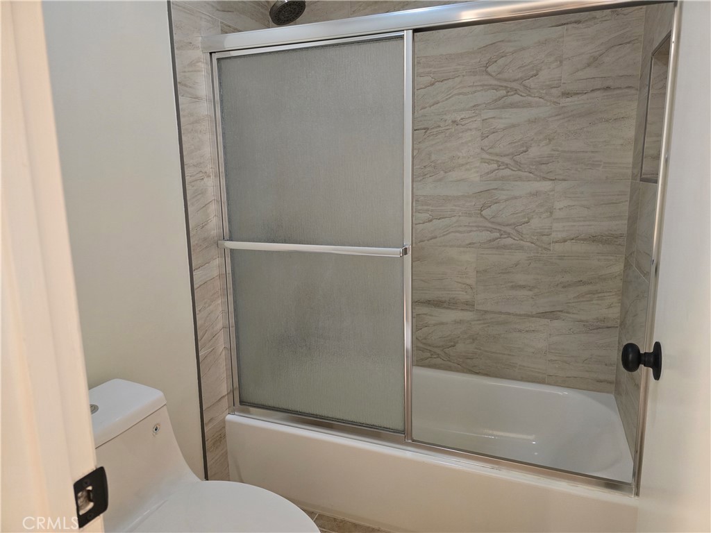 1350 West Lambert Road La Habra, CA 90631 - Photo 3 of 7 a bathroom with a shower and a toilet