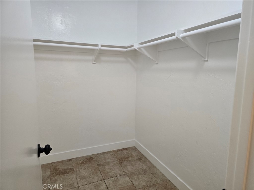 1350 West Lambert Road La Habra, CA 90631 - Photo 6 of 7 a view of an empty walk in closet