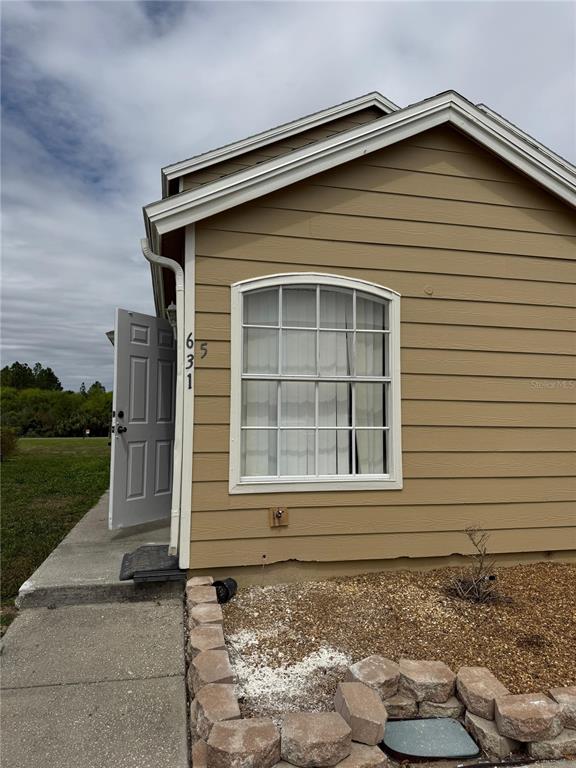 631 Washington Palm Loop, Unit 5 Davenport, FL 33897 - Photo 1 of 1 a front view of a house