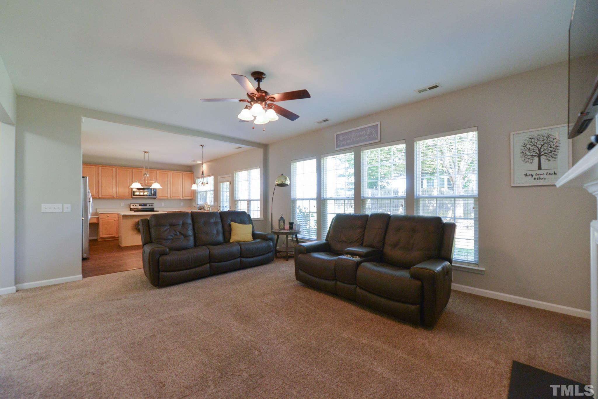 1513 Nealstone Way Raleigh, NC 27614 - Photo 15 of 30 a living room with furniture and a large window