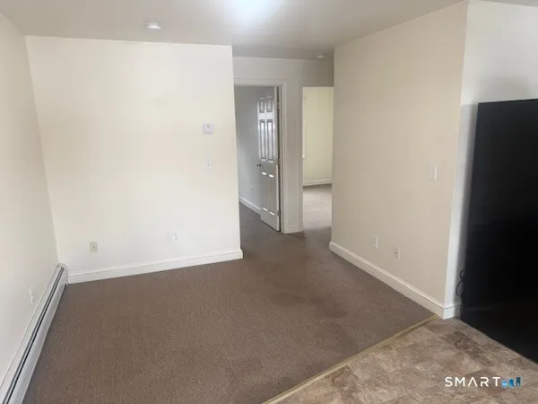 an empty room with an empty room