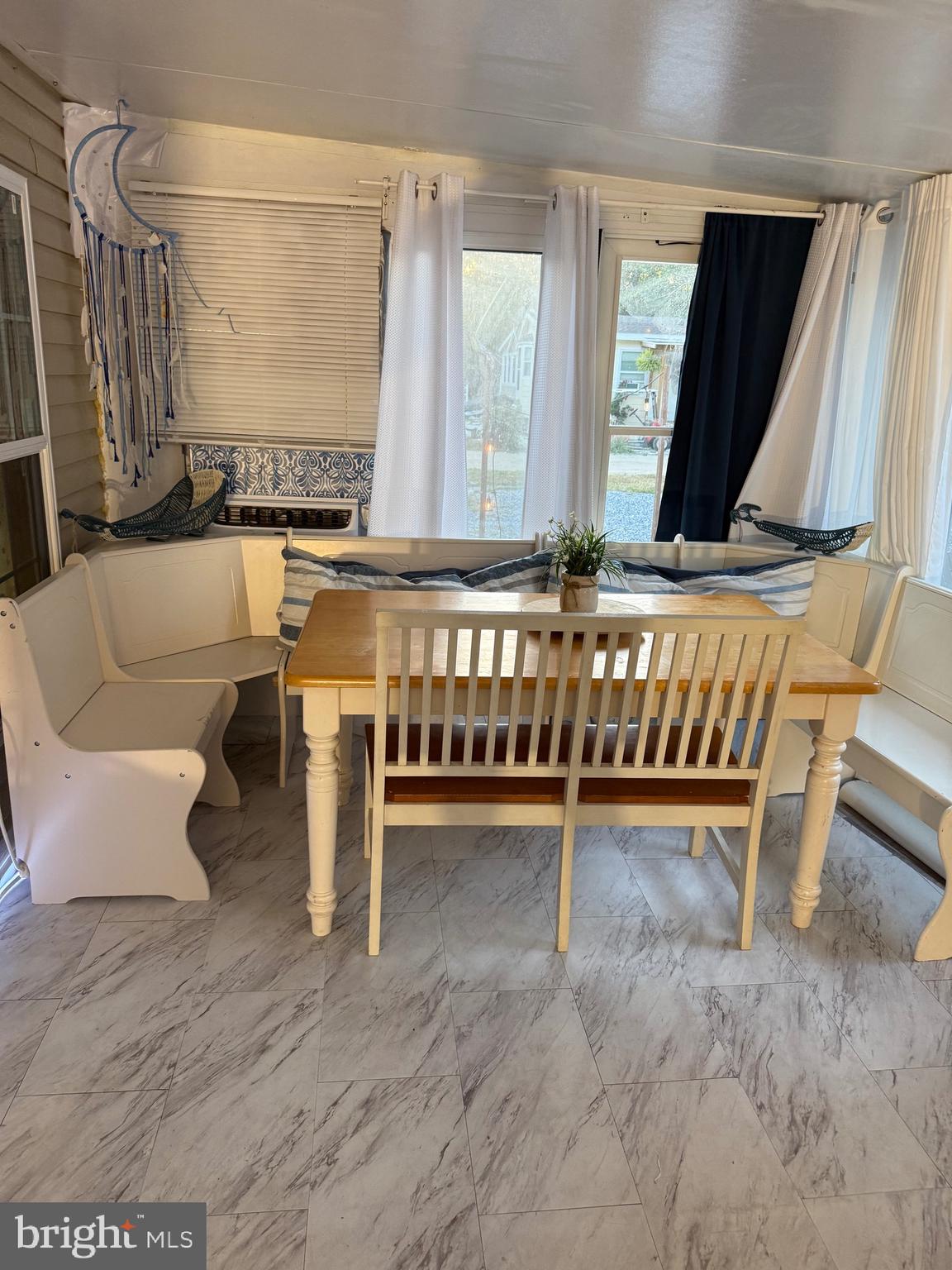 515 Corsons Tavern Road, Unit H61 Ocean View, NJ 08230 - Photo 14 of 18 eating area in florida room