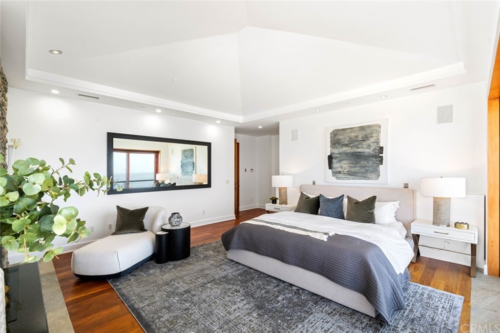 11 Camel Point Drive Laguna Beach, CA 92651 - Photo 20 of 67 a bedroom with a bed and a couch