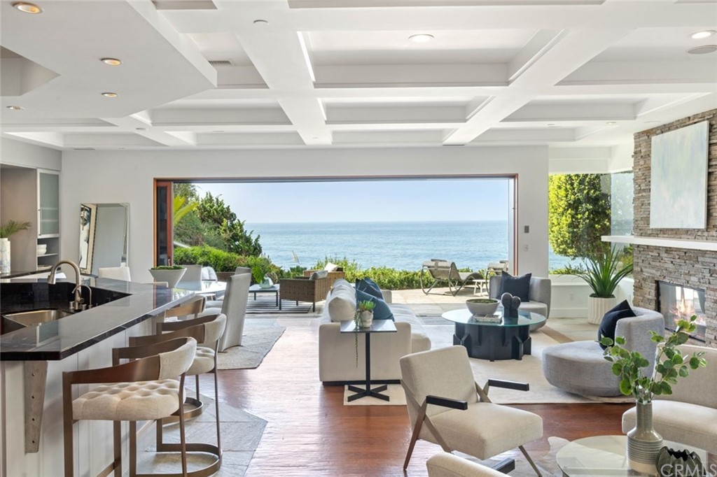 11 Camel Point Drive Laguna Beach, CA 92651 - Photo 2 of 67 a living room with furniture and a large window