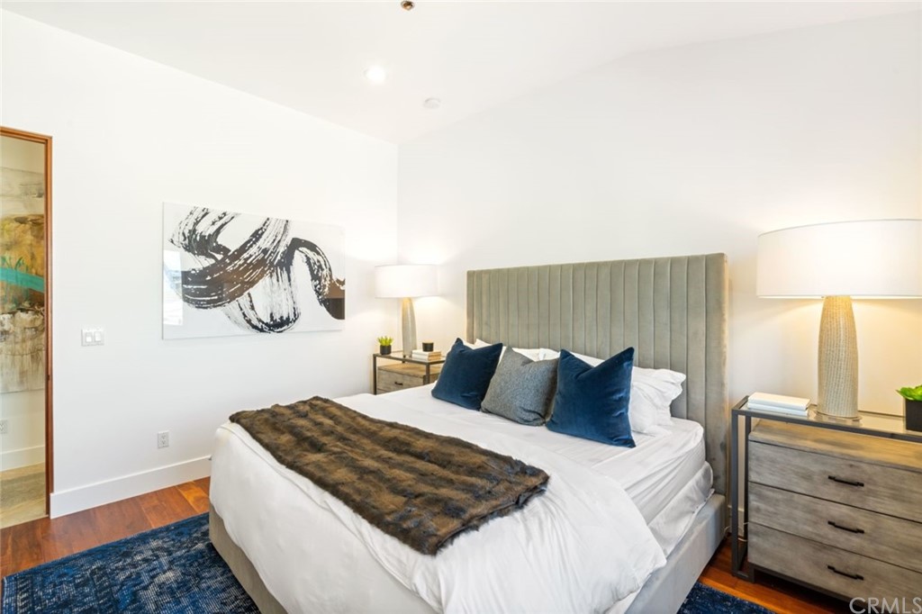 11 Camel Point Drive Laguna Beach, CA 92651 - Photo 28 of 67 a bedroom with a bed and a window