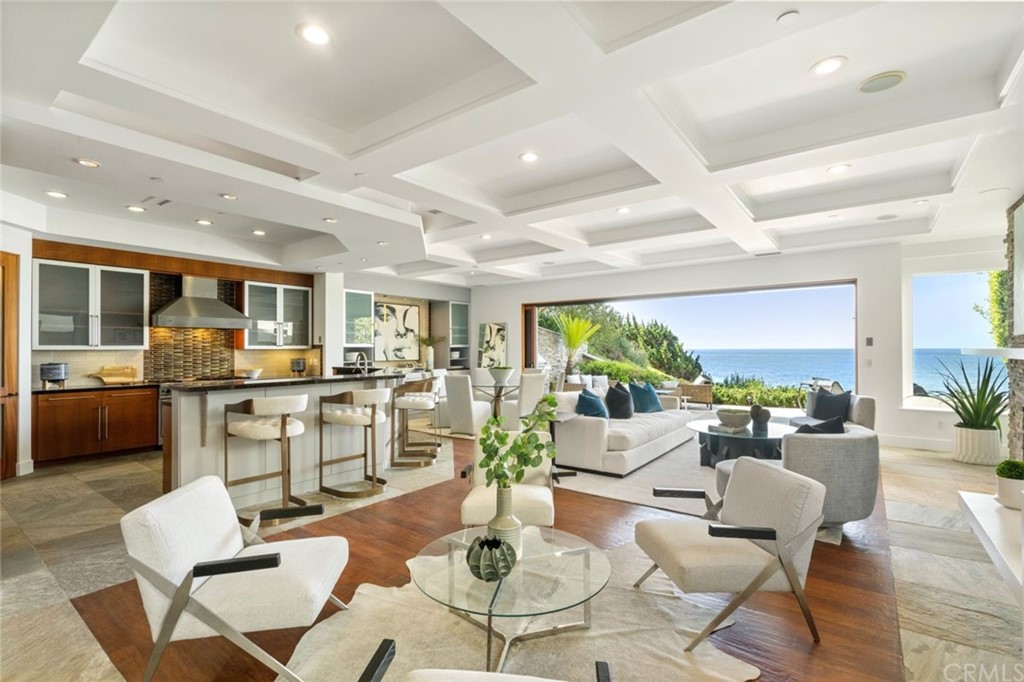 11 Camel Point Drive Laguna Beach, CA 92651 - Photo 3 of 67 a living room with furniture kitchen view and a large window