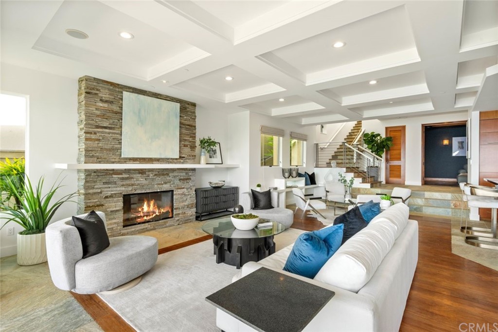 11 Camel Point Drive Laguna Beach, CA 92651 - Photo 7 of 67 a living room with furniture and a fireplace