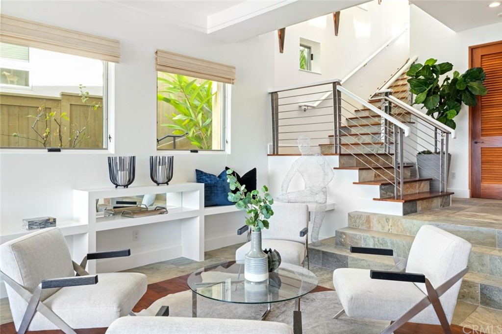 11 Camel Point Drive Laguna Beach, CA 92651 - Photo 9 of 67 a living room with furniture and a large window