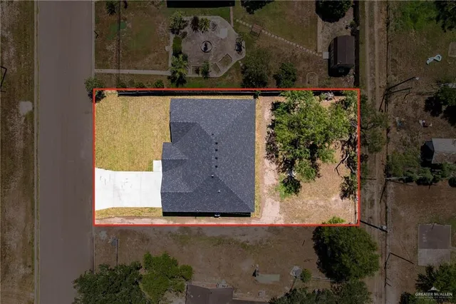 a view of a area with toys and wooden floor