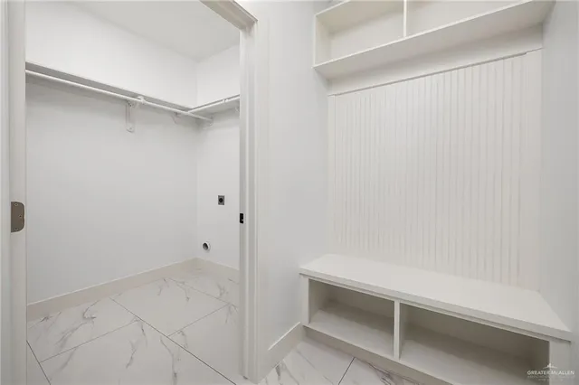 a view of an empty walk in closet