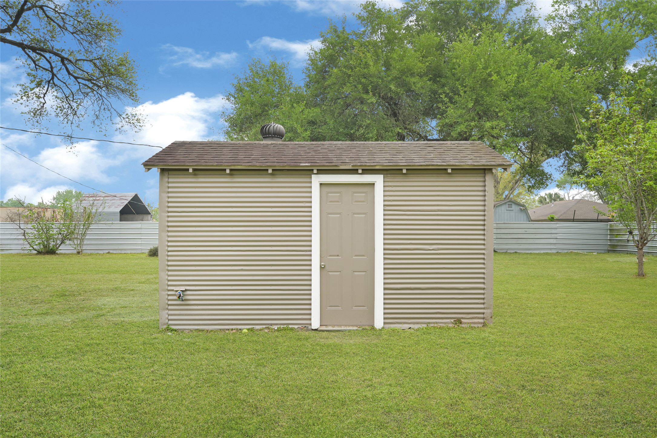 205 Grammar Road Houston, TX 77047 - Photo 21 of 26 a view of a house with a backyard