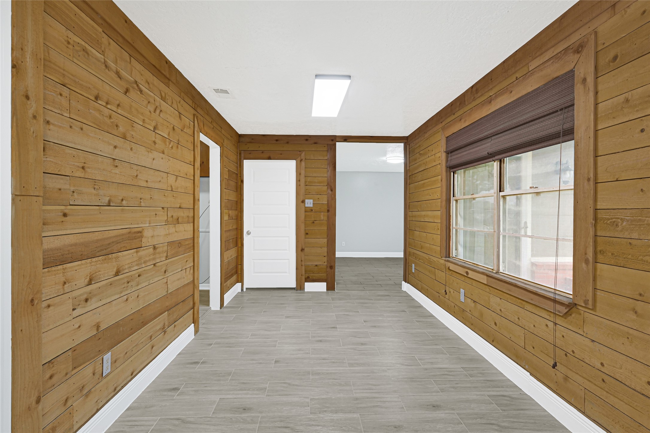 205 Grammar Road Houston, TX 77047 - Photo 7 of 26 a view of an entryway with wooden floor