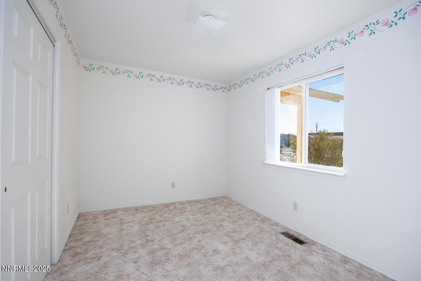 120 Hunter Park Way Fallon, NV 89406 - Photo 14 of 27 a view of a room that has a window in it
