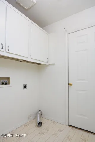 a bathroom with a sink and cabinets