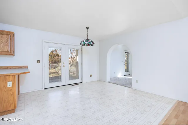 an empty room with windows