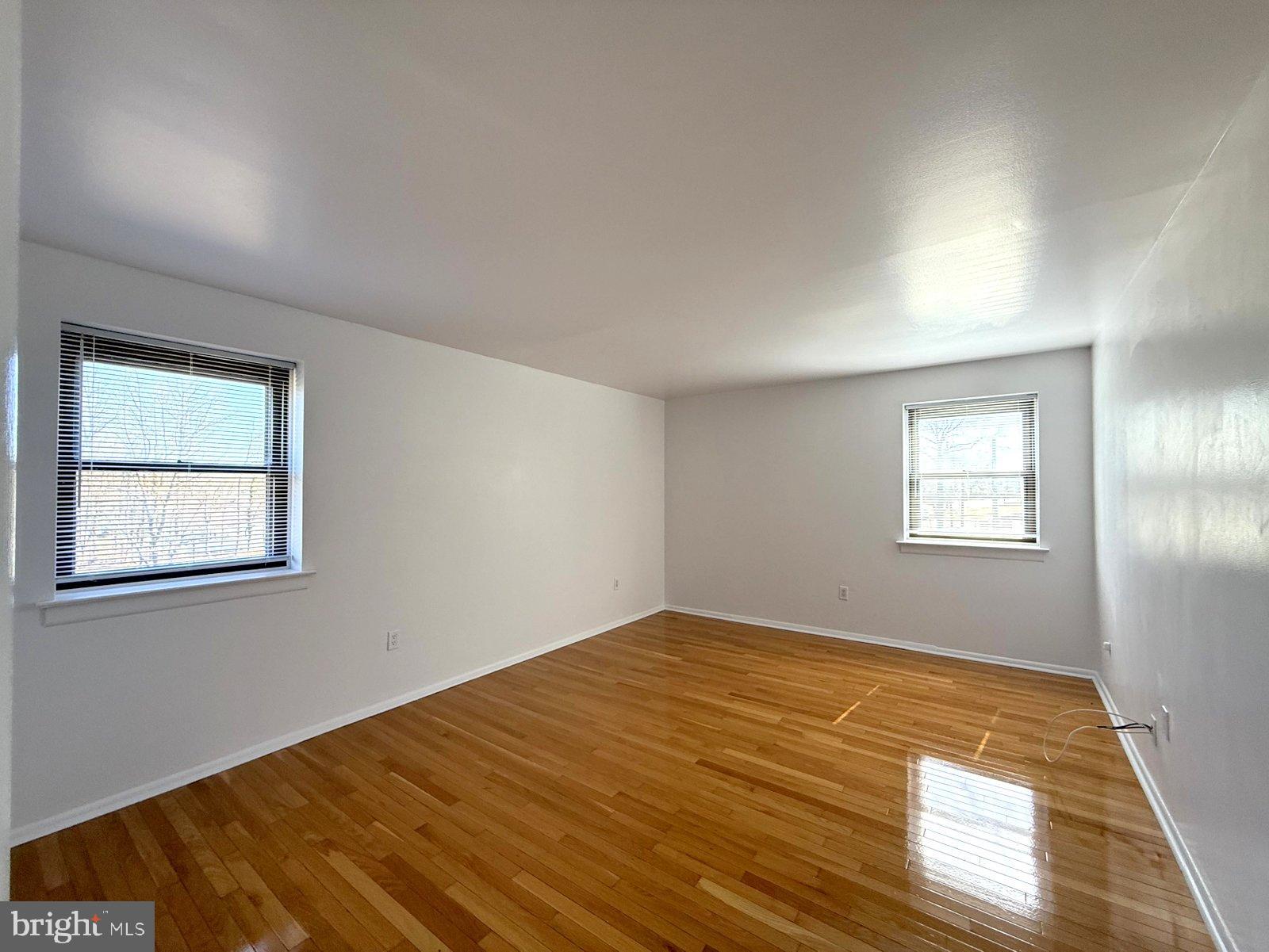 606 Cooper Landing Road, Unit A3K Cherry Hill, NJ 08002 - Photo 14 of 17 a view of empty room with wooden floor