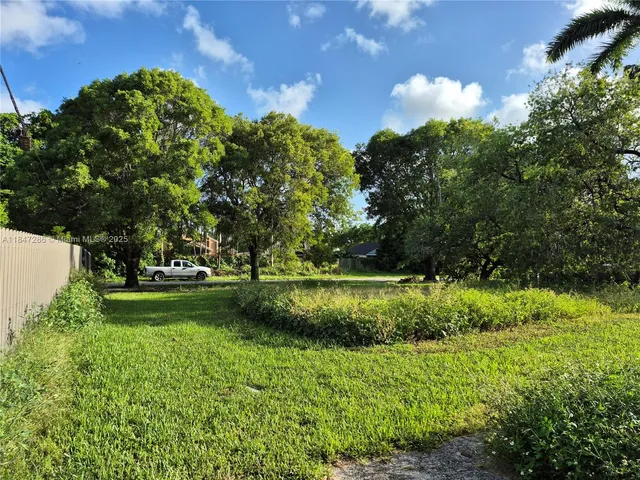 a view of a garden with an outdoor space