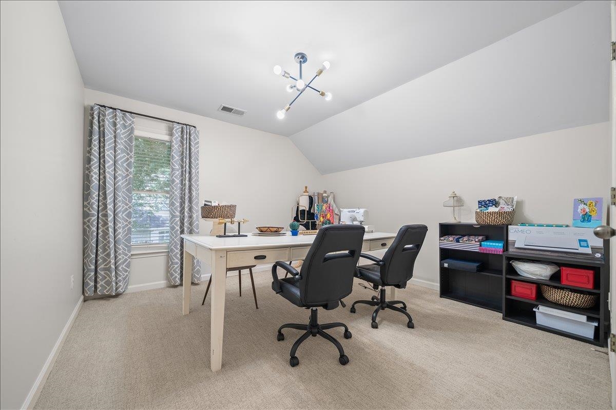 1876 Liles Lane Collierville, TN 38017 - Photo 20 of 36 Carpeted room featuring a single window, a sloped ceiling, and a contemporary multi-bulb light fixture