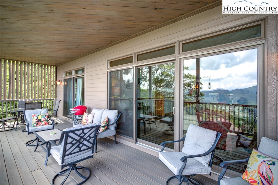 202 Pleasant View, Unit 9D Sugar Mountain, NC 28604 - Photo 15 of 48 a living room filled with furniture