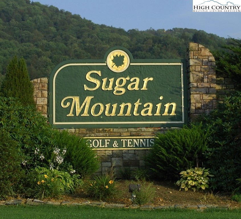 202 Pleasant View, Unit 9D Sugar Mountain, NC 28604 - Photo 39 of 48 a sign that is on a pole