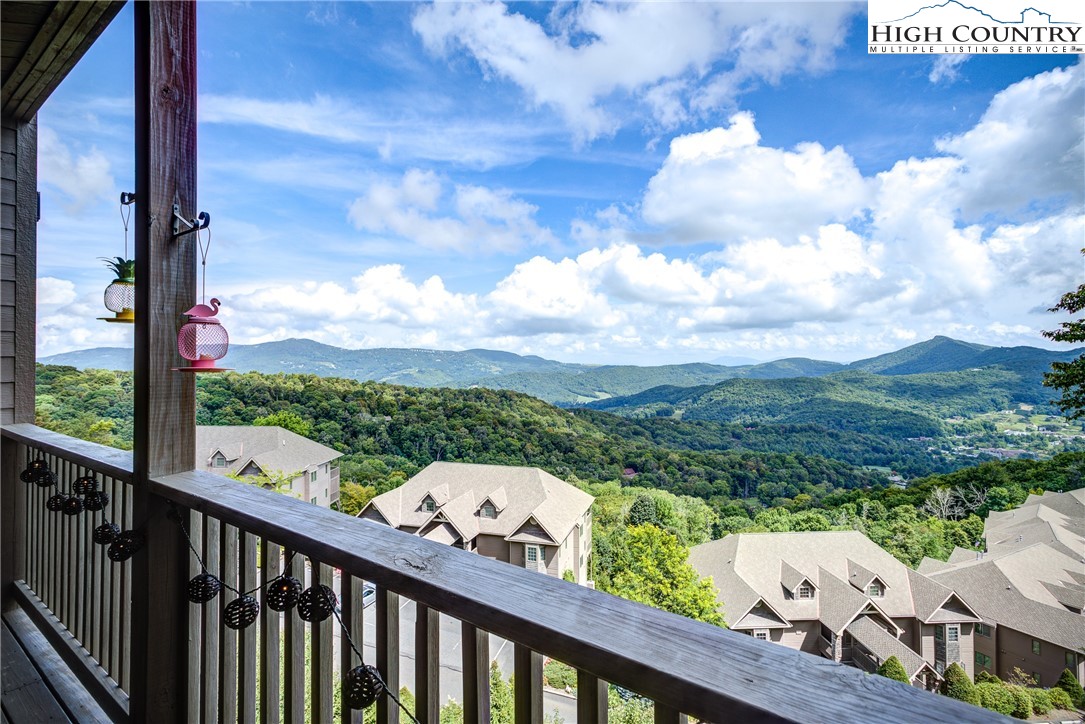 202 Pleasant View, Unit 9D Sugar Mountain, NC 28604 - Photo 5 of 48 a view of a city from a balcony