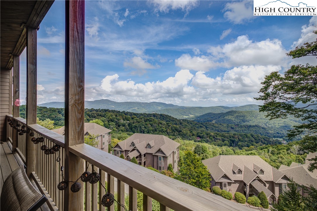 202 Pleasant View, Unit 9D Sugar Mountain, NC 28604 - Photo 8 of 48 a view of a balcony with an ocean view