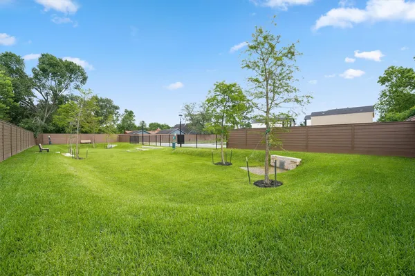 an aerial view of a house with a garden