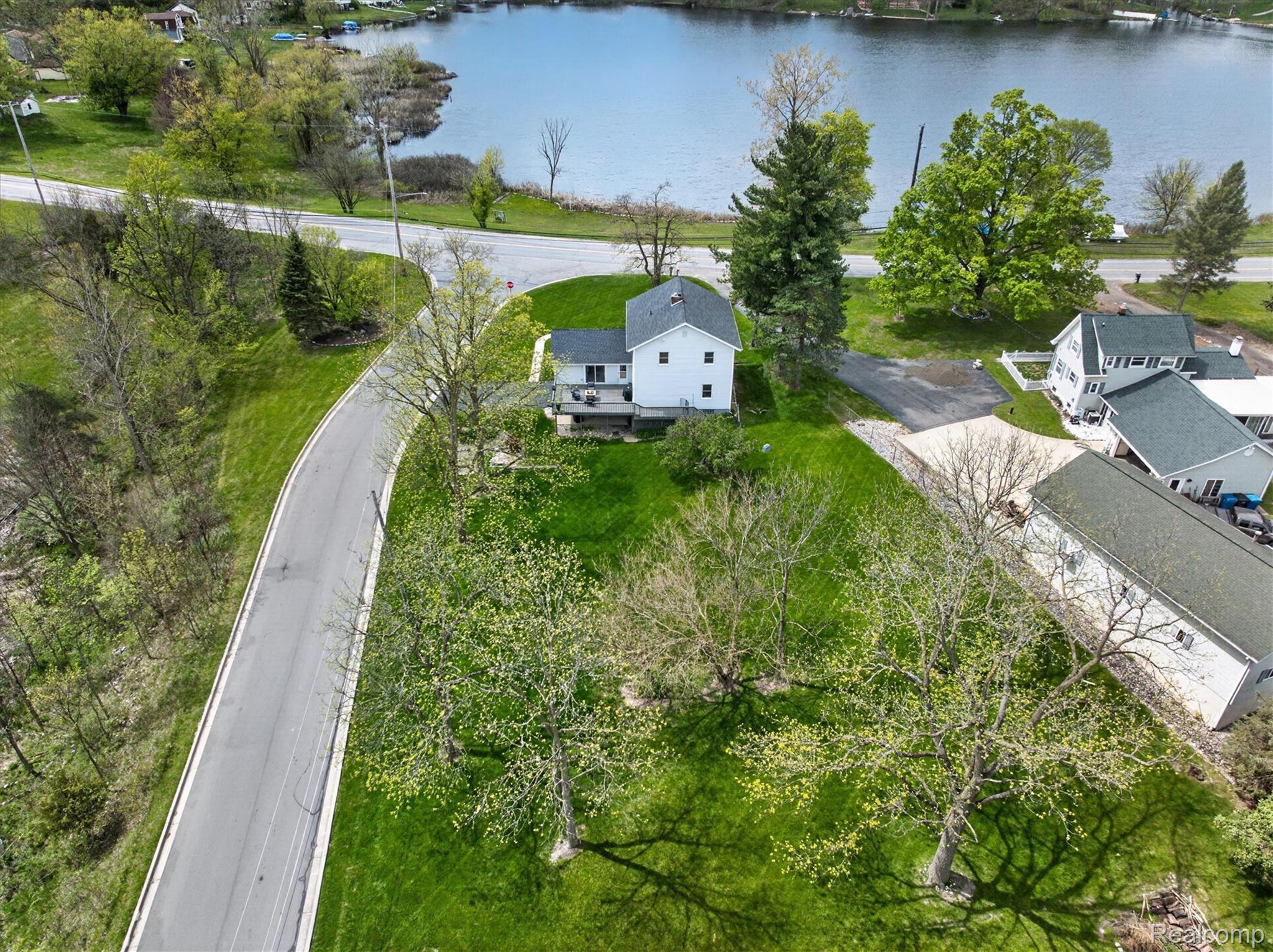 12409 Fenton Road Fenton, MI 48430 - Photo 47 of 61 Drone / aerial view of a nearby body of water