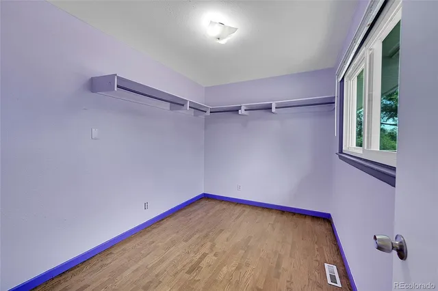 a view of a room with racks on the wall