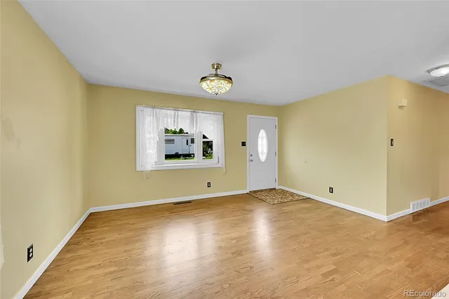 a view of an empty room with window