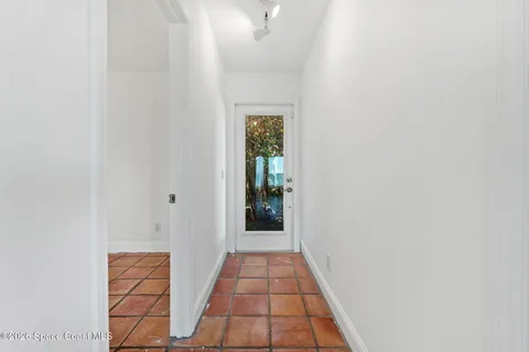 a view of a kitchen with a stove and a sink