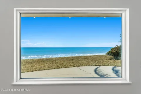 a kitchen with stainless steel appliances granite countertop a refrigerator a stove and a sink