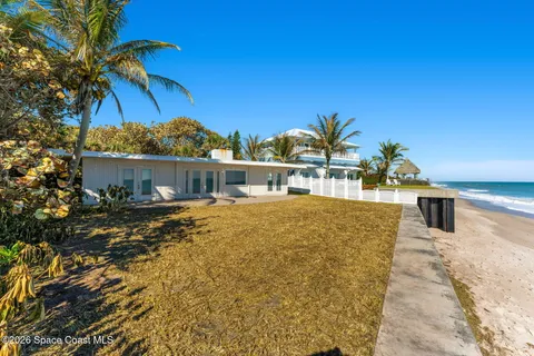 a kitchen with a sink cabinets and window