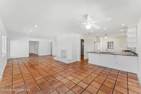 a sign that is sitting on a brick wall