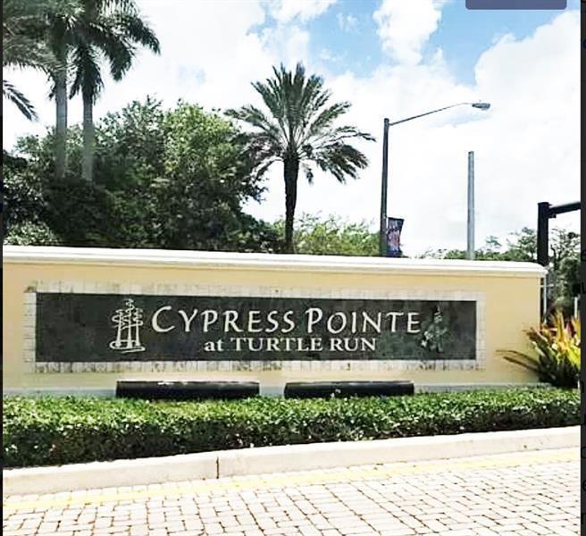 6780 West Sample Road, Unit 6780 Coral Springs, FL 33067 - Photo 1 of 7 FRONT ENRANCE