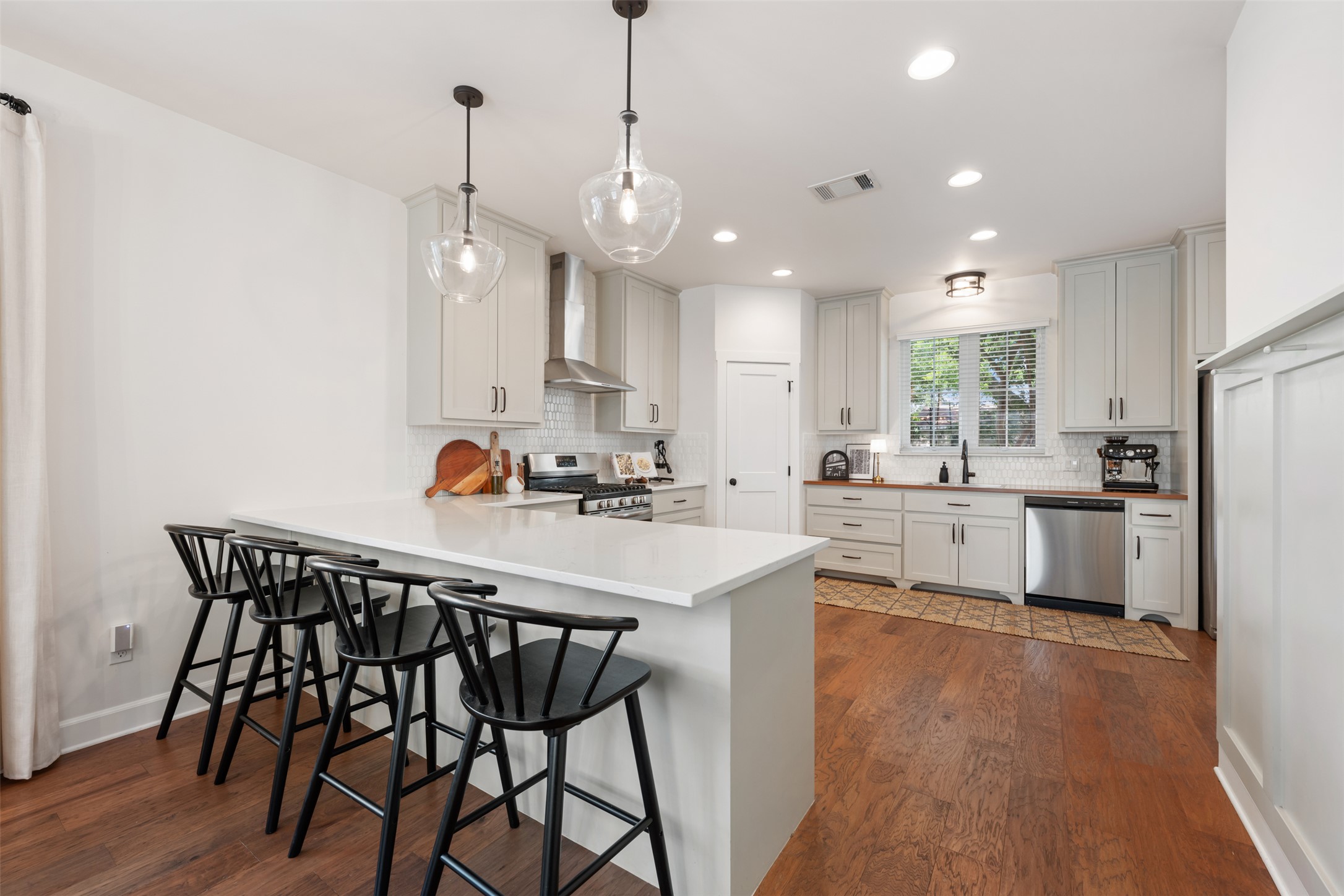 1301 West Street Georgetown, TX 78626 - Photo 11 of 40 Culinary creations come alive in this well-appointed kitchen, featuring a spacious island and quality appliances.