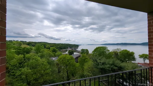a view of a lake and green space