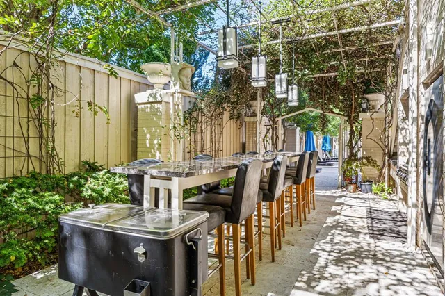 a outdoor space with patio furniture and garden