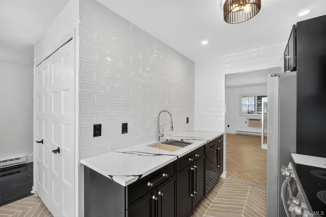 a bathroom with a double vanity sink and a mirror