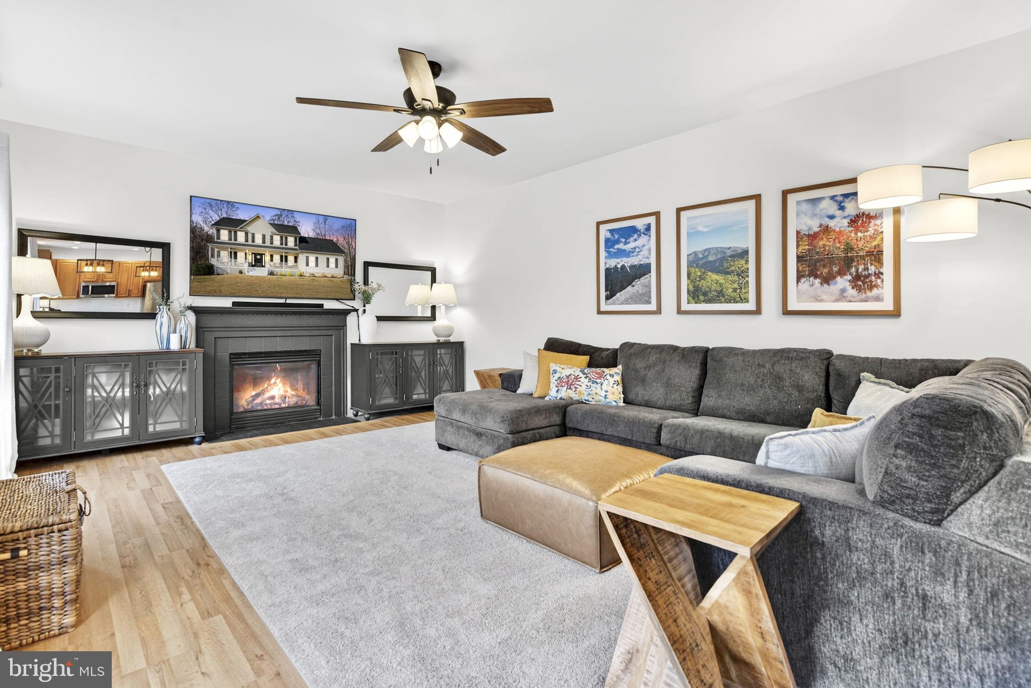 23 Richmond Road Castleton, VA 22716 - Photo 12 of 46 a living room with furniture and a fireplace