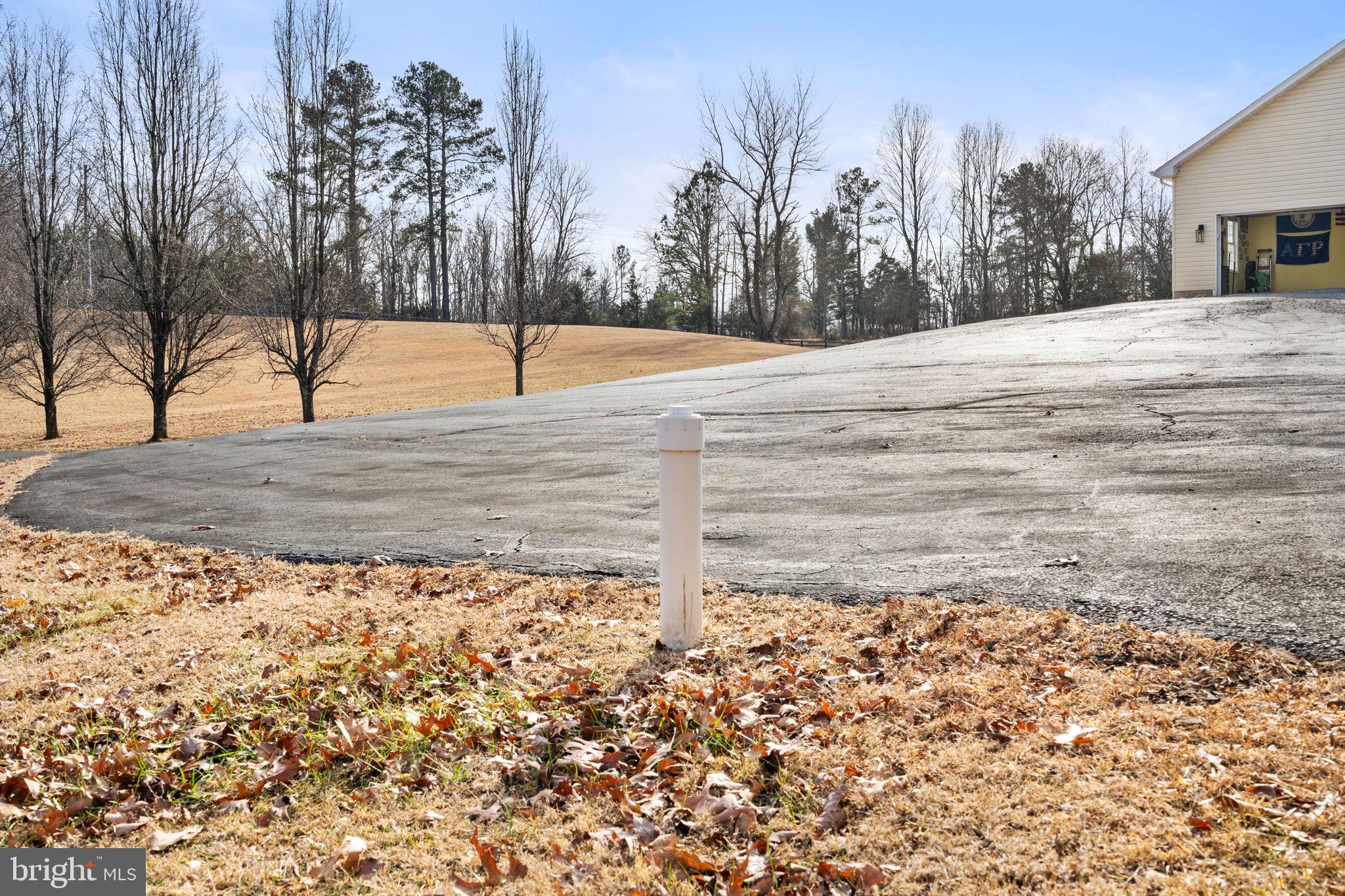 23 Richmond Road Castleton, VA 22716 - Photo 35 of 46 a backyard of a house with lots of green space