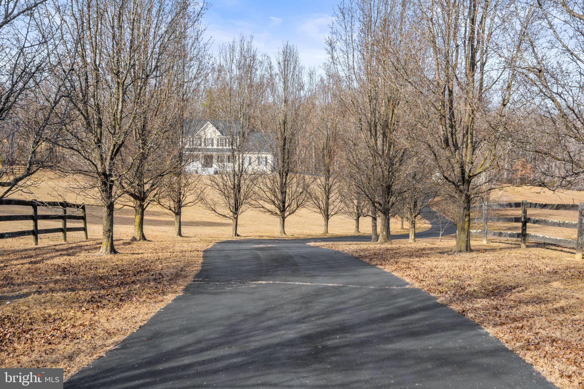 23 Richmond Road Castleton, VA 22716 - Photo 37 of 46 a view of a yard with wooden fence