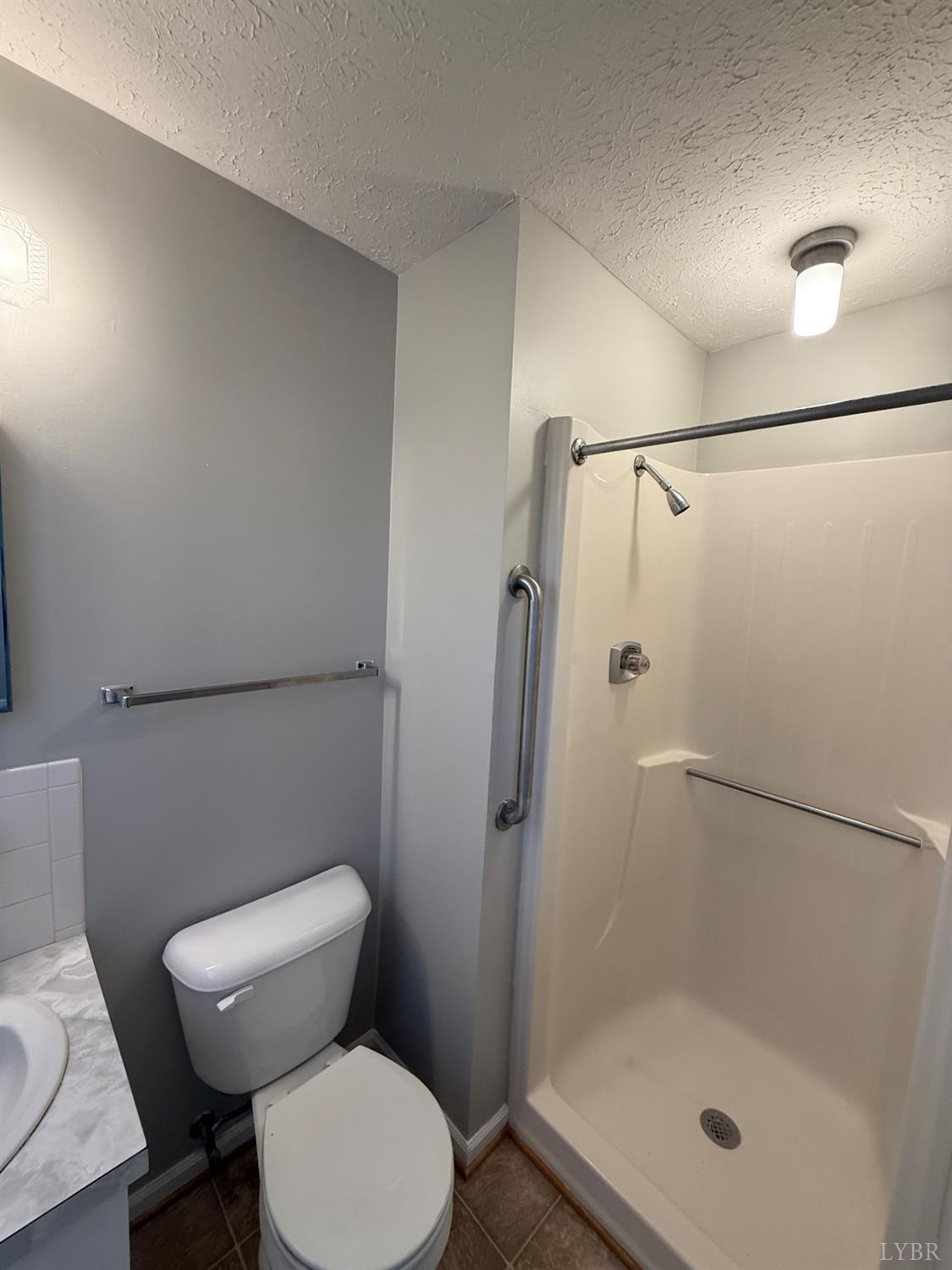 112 Wooldridge Circle Lynchburg, VA 24502 - Photo 17 of 29 a white toilet sitting next to a bath tub