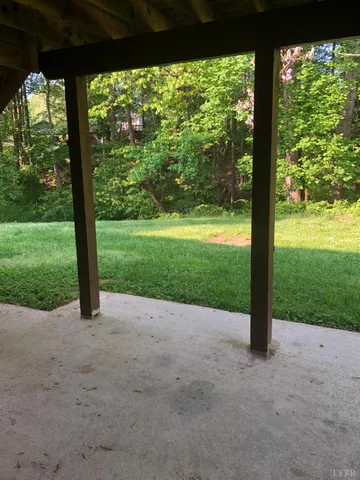 a view of a yard with porch