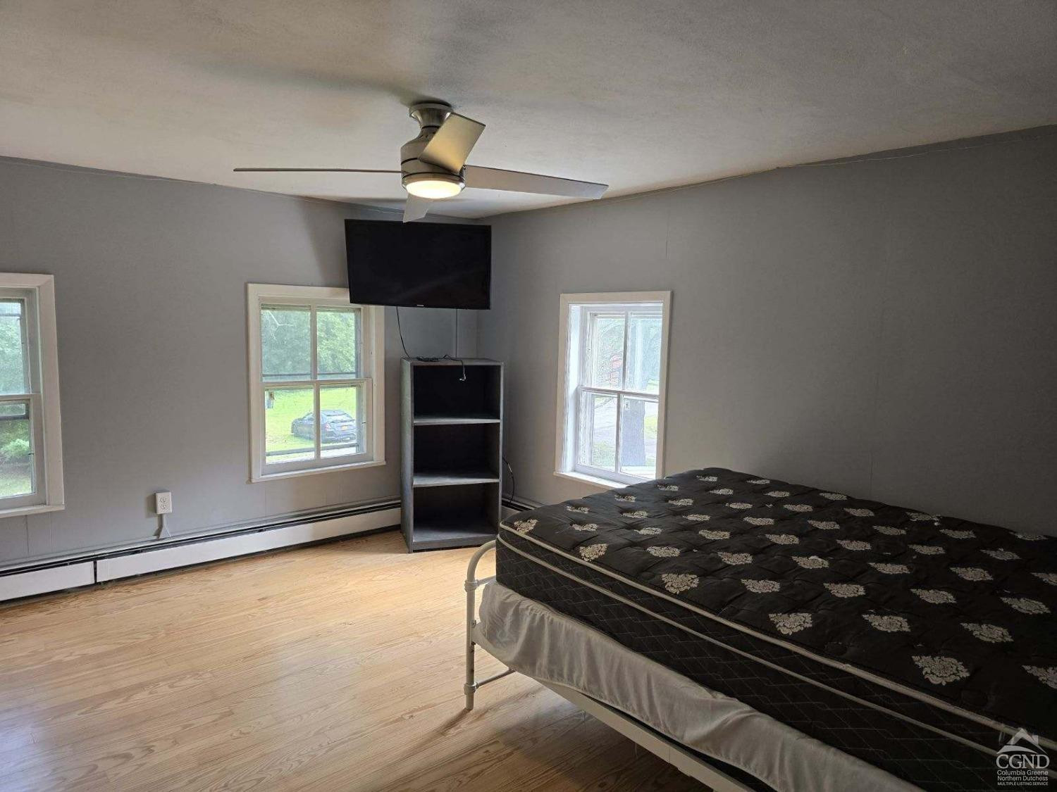 257 Saybrook Valley Road Durham, NY 12120 - Photo 26 of 36 a living room with furniture and a window