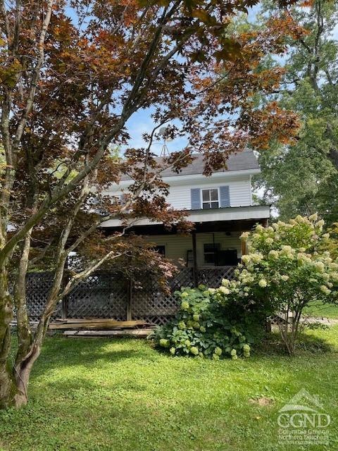 257 Saybrook Valley Road Durham, NY 12120 - Photo 35 of 36 a front view of a house with a garden