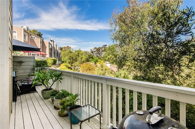 a view of storage and utility room with washer and dryer